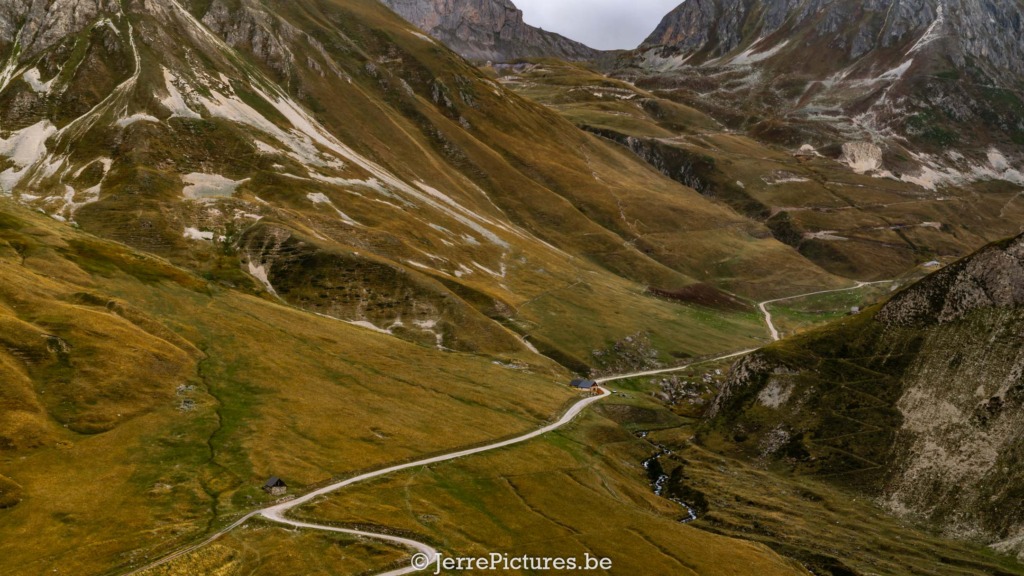 From Calm to Rally: A Unique Journey Through the Col du Galibier